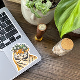smiley tiger sticker on laptop